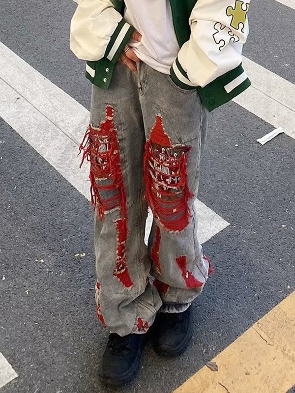 Lose Herrenjeans in blauer Waschung im Distressed-Look