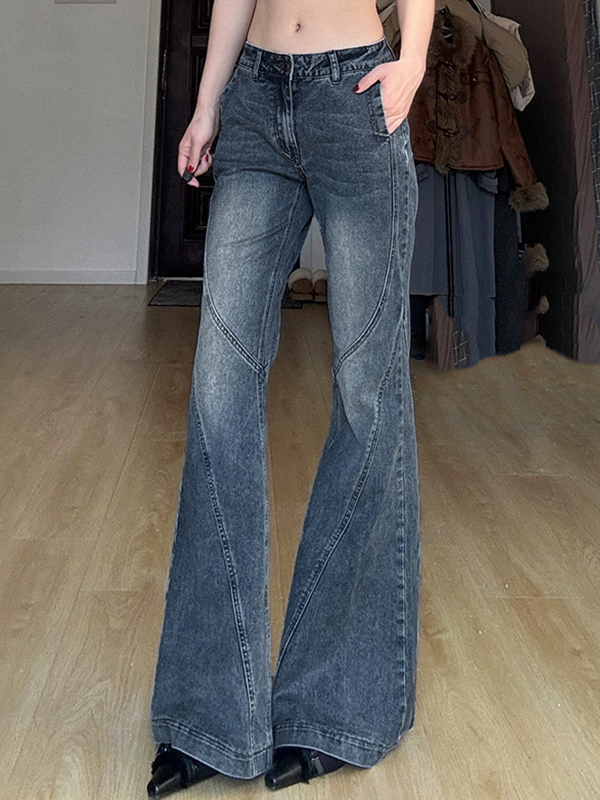 Schlagjeans mit Farbverlauf und gealtertem Schlitzdesign