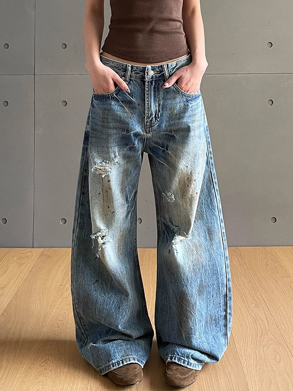 Verwaschene Boyfriendjeans mit Rissen