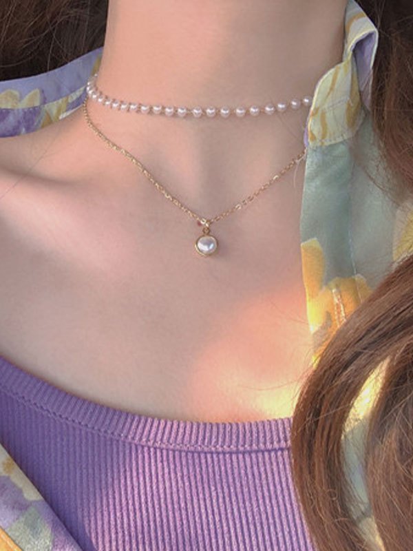 Doppellagige Halskette mit Kunstperlen