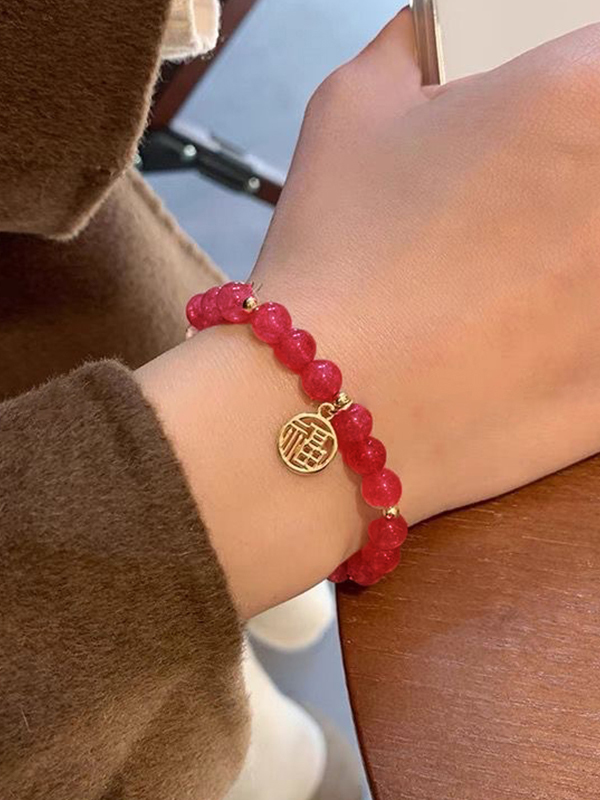 Rosafarbenes chinesisches Kristall-Anhänger-Armband